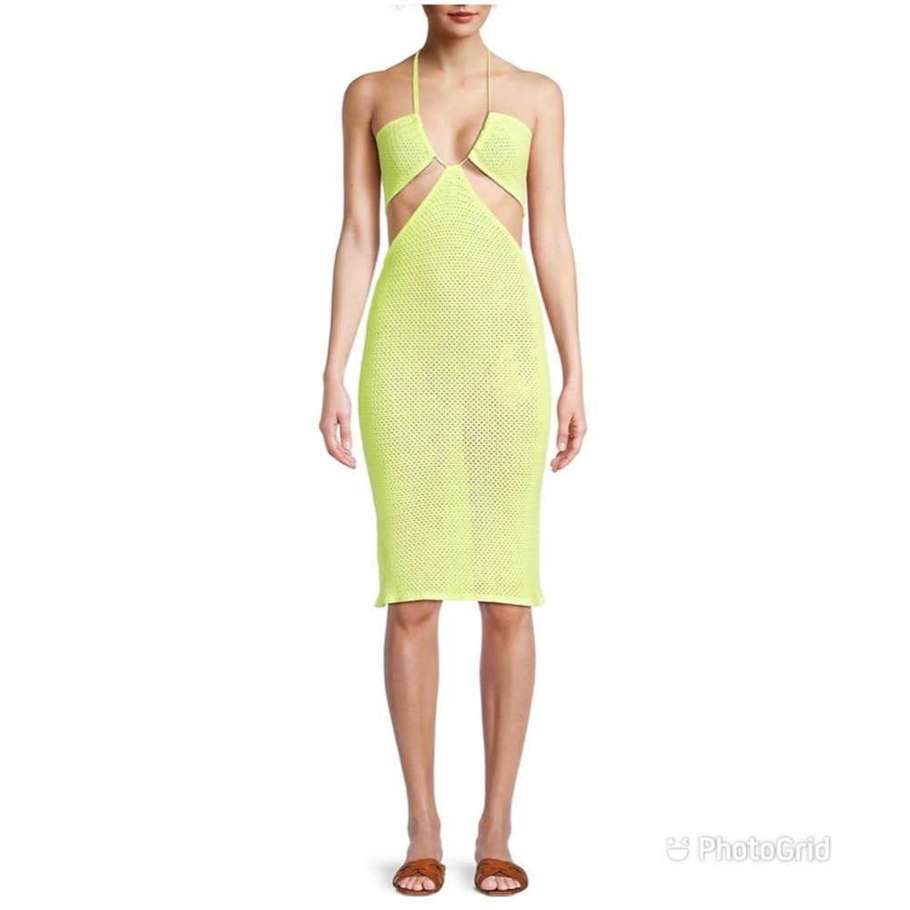 Victor Glemaud minidress made of knit cotton crochet with cut-outs at the waist.